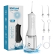 Piston pump water flosser